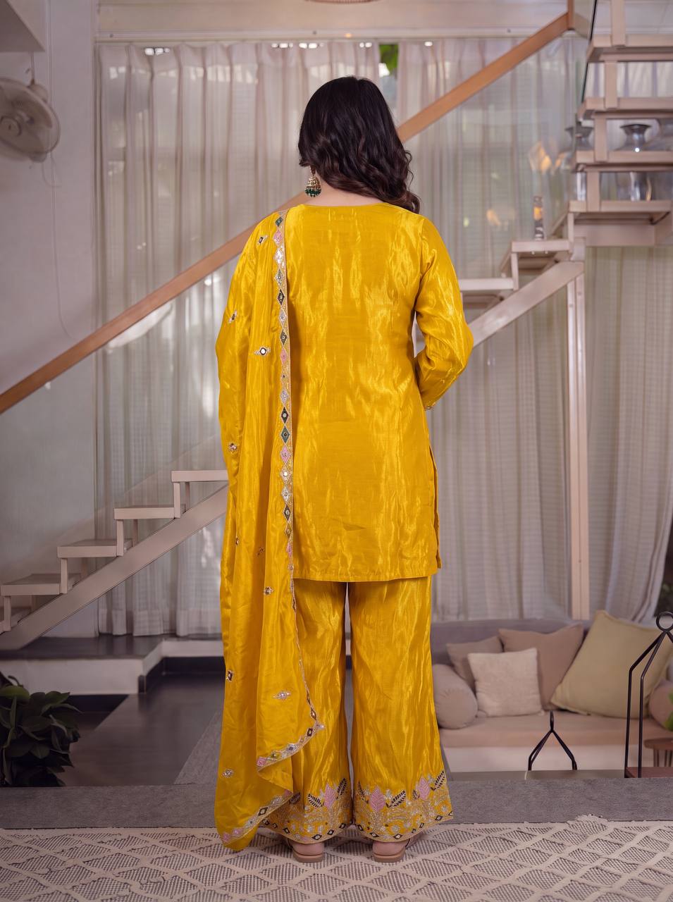 Elegant Rust Orange Silk Kurta and Flared Palazzo Set Adorned with Intricate Multicolored Botanical Embroidery and Mirror Work